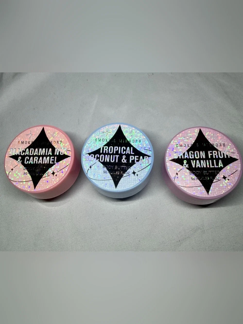 3 small tubes of different scented lotions